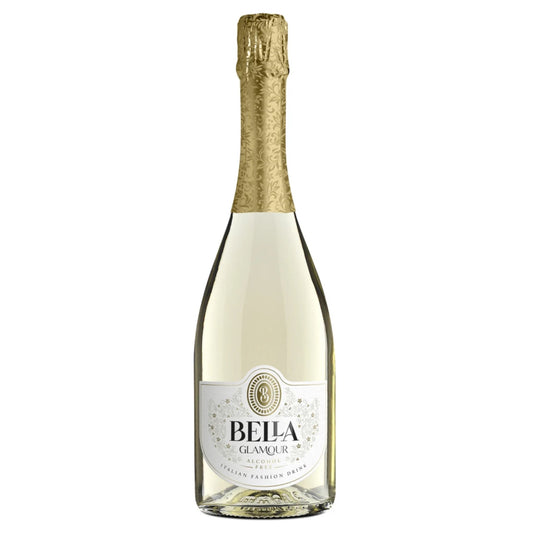 A sophisticated bottle of Bella Glamour Alcohol Free Italian Fashion Drink stands upright against a clean white background. The bottle is clear, showcasing the pale yellow, sparkling beverage within. Its neck is covered in an elegant, textured gold foil. The white label features a classic design with a gold framed crest at the top, followed by "BELLA" in large, stylized gold lettering. Below that, "GLAMOUR" is written in a smaller, delicate black script. "ALCOHOL FREE" is prominently displayed.