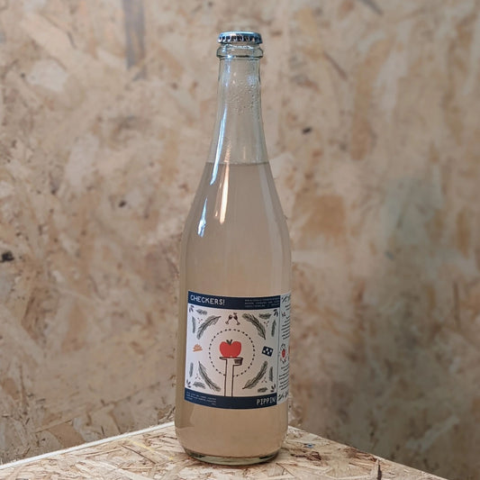 A clear glass bottle of Checkers! Pippin drink with a light liquid, featuring a label with an apple graphic and text.