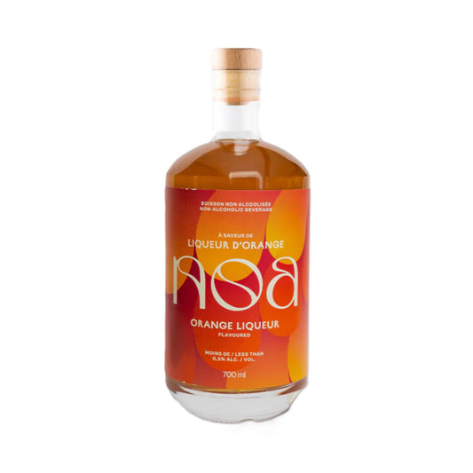 A glass bottle with an orange-red label and a wooden cork. The label features a gradient of orange and red circles. "BOISSON NON ALCOOLISEE" and "NON-ALCOHOLIC BEVERAGE" are written at the top. Below that, "À SAVEUR DE" and "LIQUEUR D'ORANGE" are displayed, with "noa" in large, stylized white letters. The label also states "ORANGE LIQUEUR", "FLAVOURED", "MOINS DE / LESS THAN 0.5% ALC./VOL.", and "700 ml". The bottle is set against a white background.