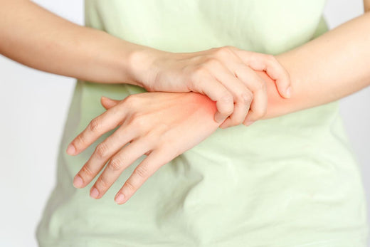 A person experiencing joint pain and inflammation, potentially related to arthritis or other health conditions.