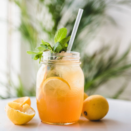 A photo of bee’s knees mocktail in a mason jar.