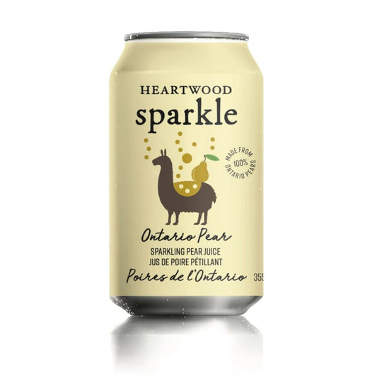 A pale yellow aluminum can labeled “HEARTWOOD Sparkle Ontario Pear” is centered on a plain white background. The design is clean and minimal, featuring black text and a simple illustration. Yellow bubbles rise above a dark llama wearing a spotted blanket, balancing a pear with a green leaf. A circular stamp reads “MADE FROM 100% ONTARIO PEARS.” Lower text describes sparkling pear juice in English and French, with “355” indicating the can’s volume.
