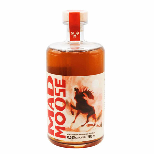 A front-facing view of a Mad Moose bottle, showing the amber liquid, a clear cap with a red and white design, and a white label with "MAD MOOSE" in large red letters and an illustration of a running moose. The label also indicates "NON-ALCOHOLIC WHISKEY / WHISKY NON ALCOOLISE" and "0.05% ALC/VOL. 750 ML.