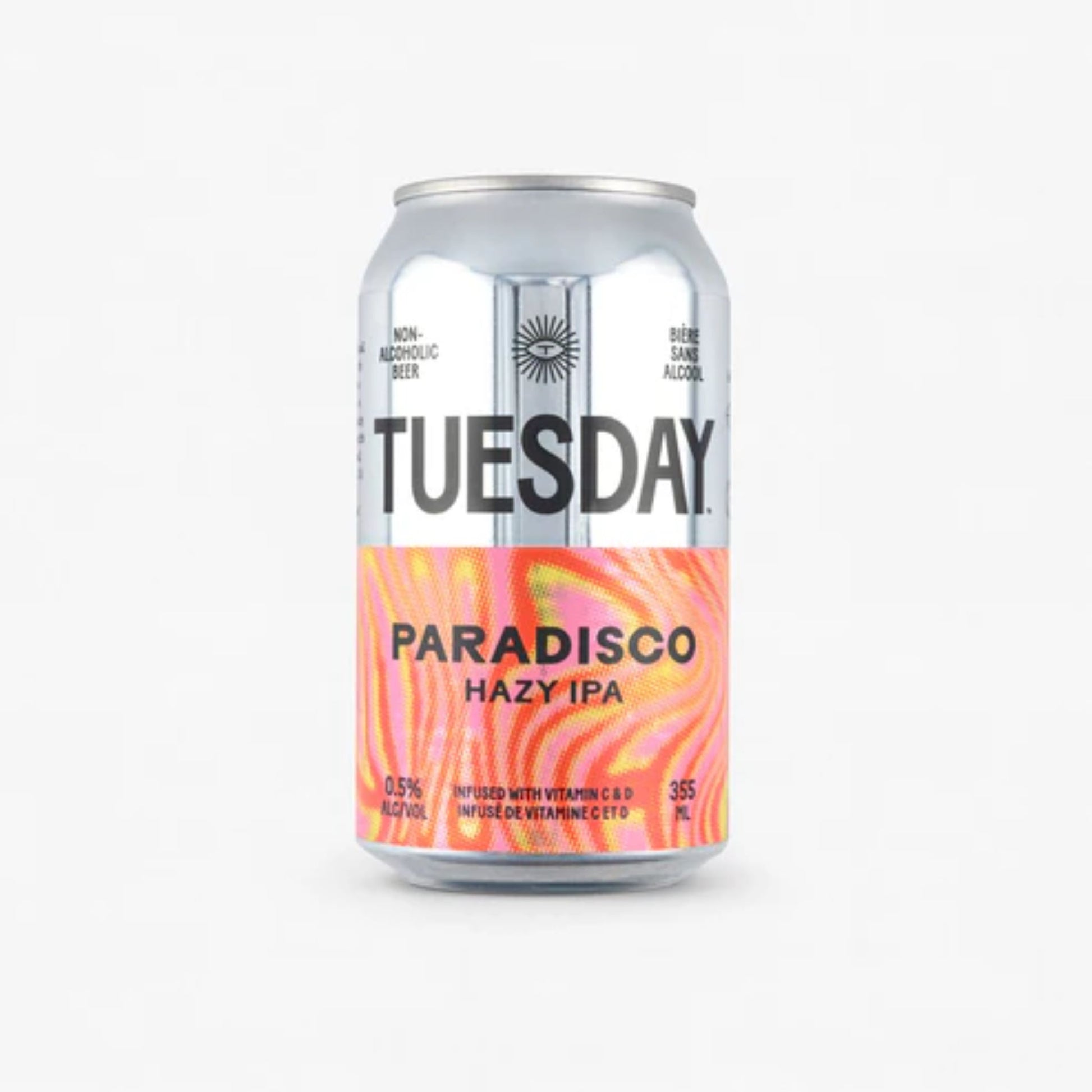 The image shows a silver can of Tuesday Paradisco Non-Alcoholic Hazy IPA. The can has a black label with the brand name "Tuesday" in large white letters. The can is labeled as non-alcoholic beer with 0.5% alcohol by volume. It is also infused with vitamins C and D.